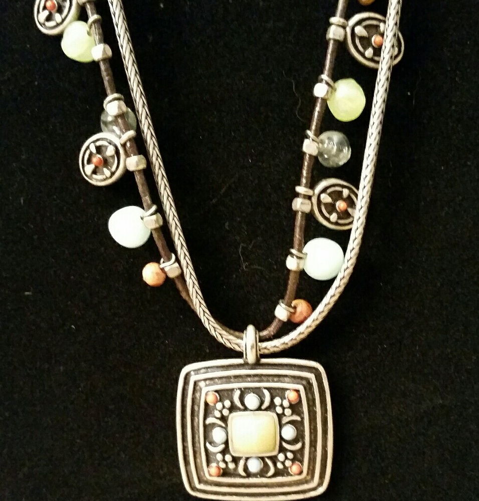 Necklace with beads and medalion